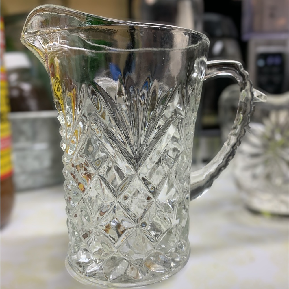 Pressed glass pitcher. Small.